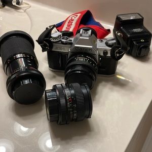 Vintage Canon Camera with additional lenses.
